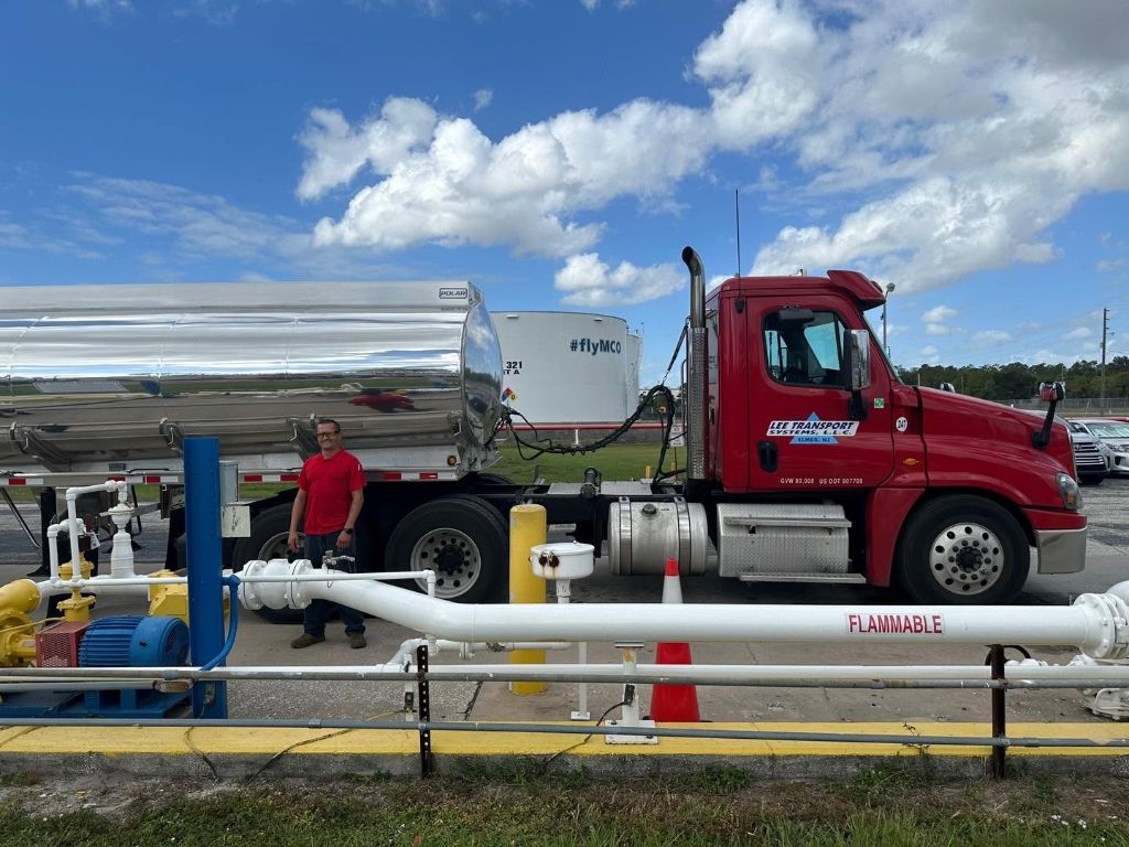 Lee Transport driver and truck at MCO airport